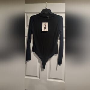 NAKED WARDROBE Mesh Long Sleeve Bodysuit Nwt and bag.